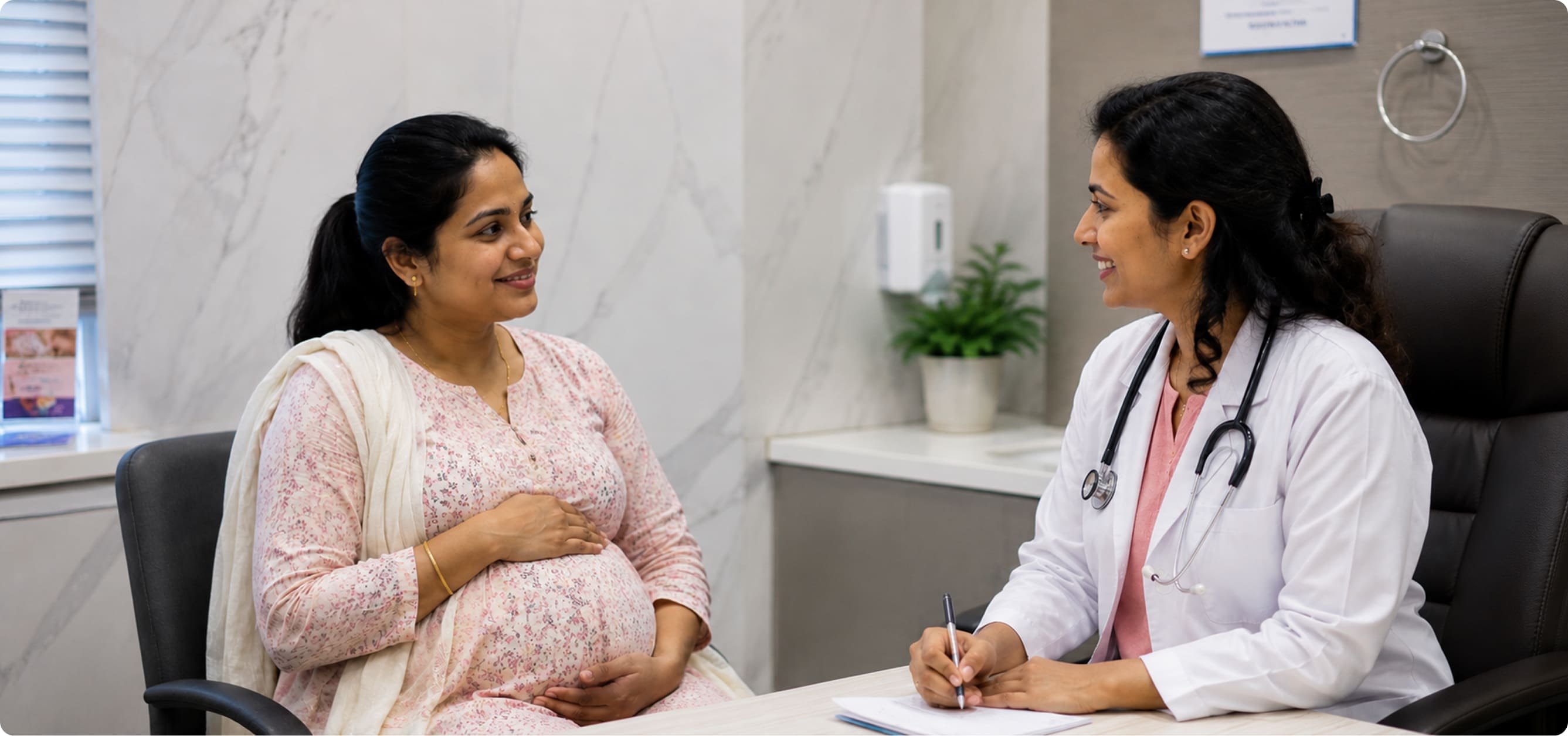 An expectant mother with her doctor